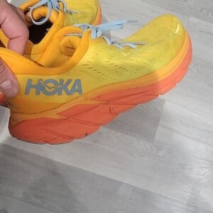 Hoka Clifton 8 running shoes in the Radiant Yellow/Maize colorway. Size 13